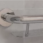 flange cover on the shampoo shelf